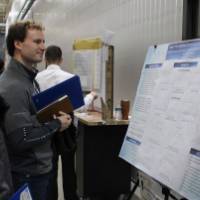 people looking at a senior project